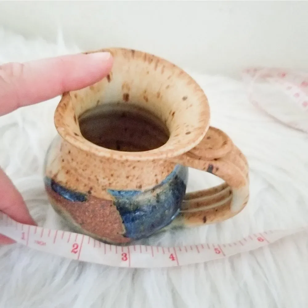 Pottery creamer signed by artist